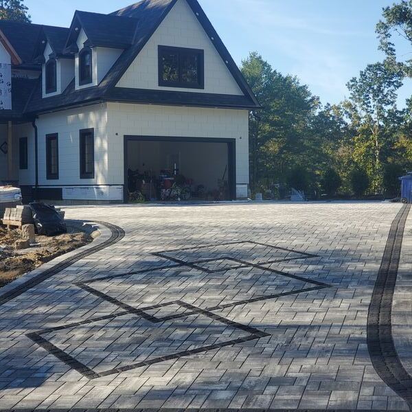 Interlocking paver driveway with double border design