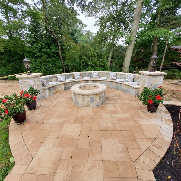 Expansive patio with fire pit seating area